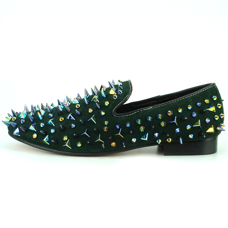 A single green shoe with a luxurious suede finish features multicolored, iridescent spikes and studs adorning the top and sides, presented beautifully on a plain white background. This stunning piece is crafted by Fiesso, known for their Fiesso by Aurelio Garcia line.