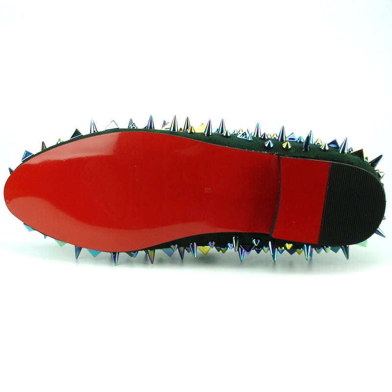 A single green shoe with a luxurious suede finish features multicolored, iridescent spikes and studs adorning the top and sides, presented beautifully on a plain white background. This stunning piece is crafted by Fiesso, known for their Fiesso by Aurelio Garcia line.