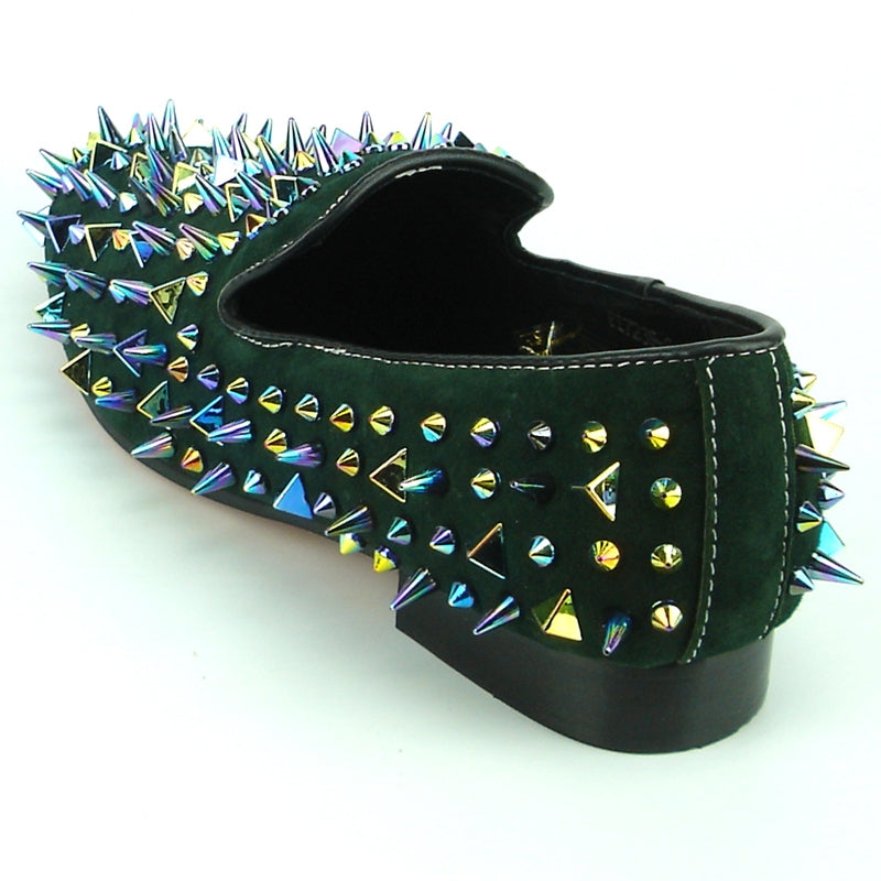 A single green shoe with a luxurious suede finish features multicolored, iridescent spikes and studs adorning the top and sides, presented beautifully on a plain white background. This stunning piece is crafted by Fiesso, known for their Fiesso by Aurelio Garcia line.