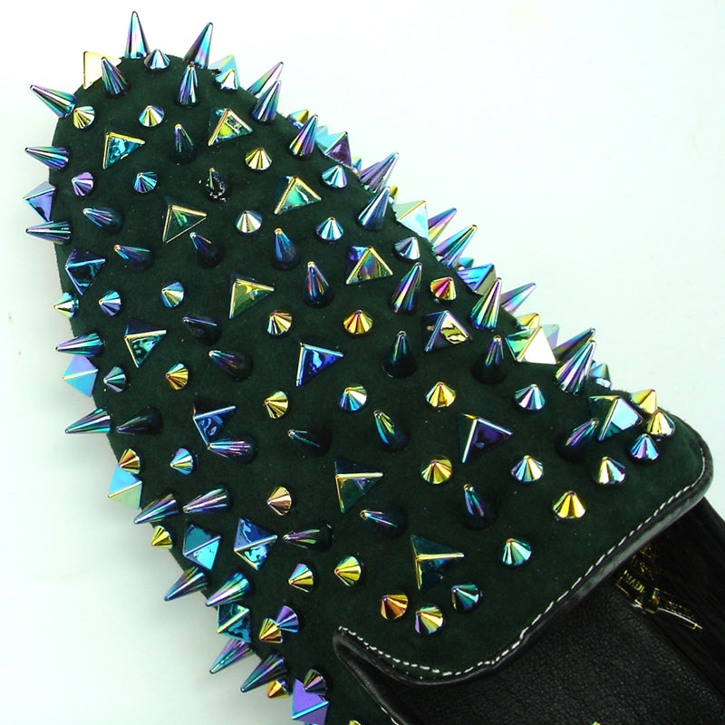 A single green shoe with a luxurious suede finish features multicolored, iridescent spikes and studs adorning the top and sides, presented beautifully on a plain white background. This stunning piece is crafted by Fiesso, known for their Fiesso by Aurelio Garcia line.