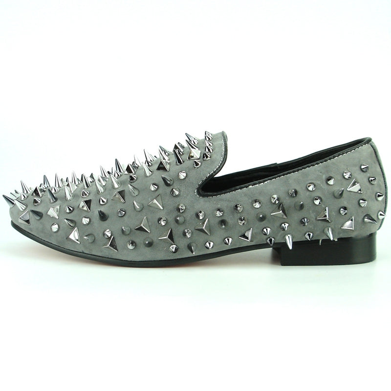 The FI-7239-S Grey Suede Silver Spikes Fiesso by Aurelio Garcia shoe from Fiesso features an array of silver and multicolor spikes and studs embellishing its surface, paired with a sleek black sole.