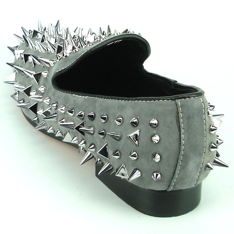 The FI-7239-S Grey Suede Silver Spikes Fiesso by Aurelio Garcia shoe from Fiesso features an array of silver and multicolor spikes and studs embellishing its surface, paired with a sleek black sole.