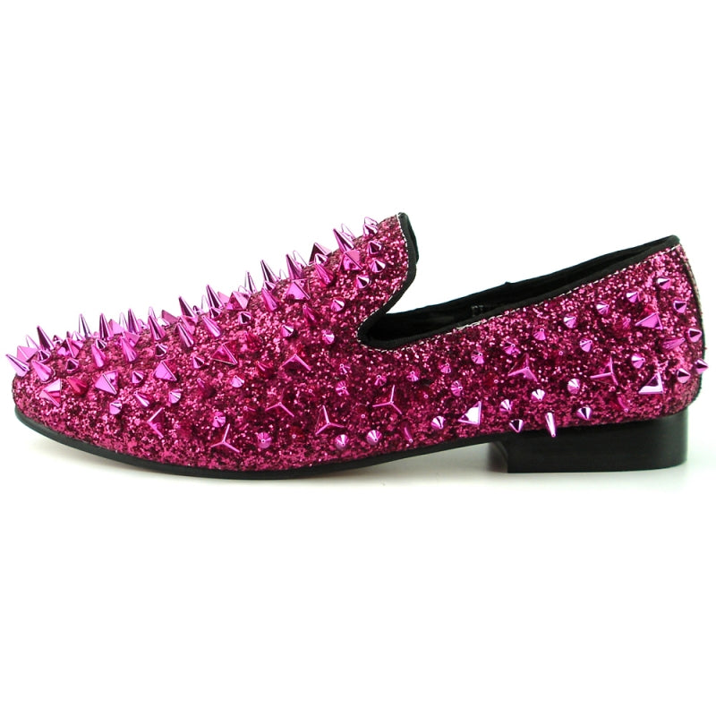 This pink slip-on, the FI-7239 Rose Glitter Rose Spikes by Fiesso, features a suede upper accented with dazzling shiny spikes and a glittery finish.