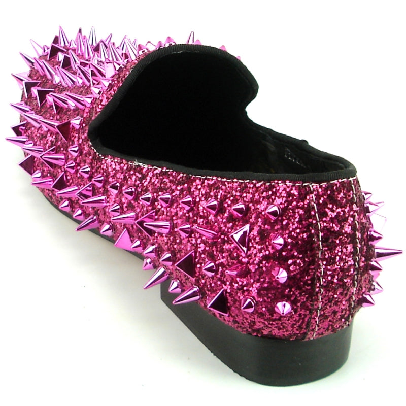 This pink slip-on, the FI-7239 Rose Glitter Rose Spikes by Fiesso, features a suede upper accented with dazzling shiny spikes and a glittery finish.