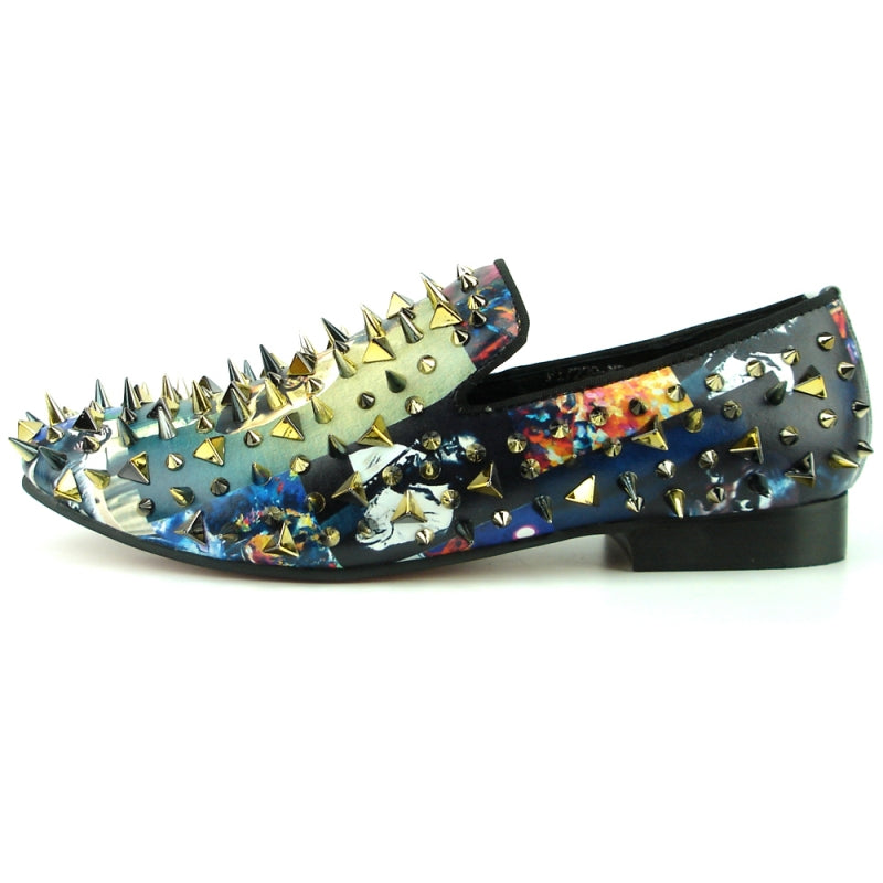 The FI-7239 Miles Davis Gold Spikes Fiesso by Aurelio Garcia shines as a multicolored loafer embellished with metallic spikes and studs, showcasing a glittery upper that draws attention from every angle.