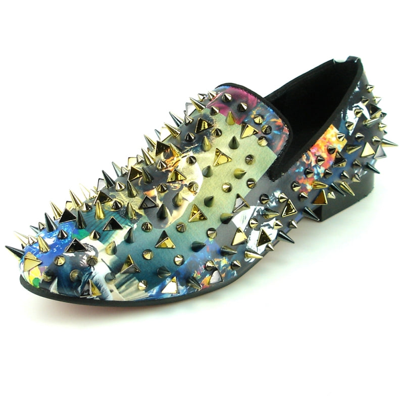 The FI-7239 Miles Davis Gold Spikes Fiesso by Aurelio Garcia shines as a multicolored loafer embellished with metallic spikes and studs, showcasing a glittery upper that draws attention from every angle.