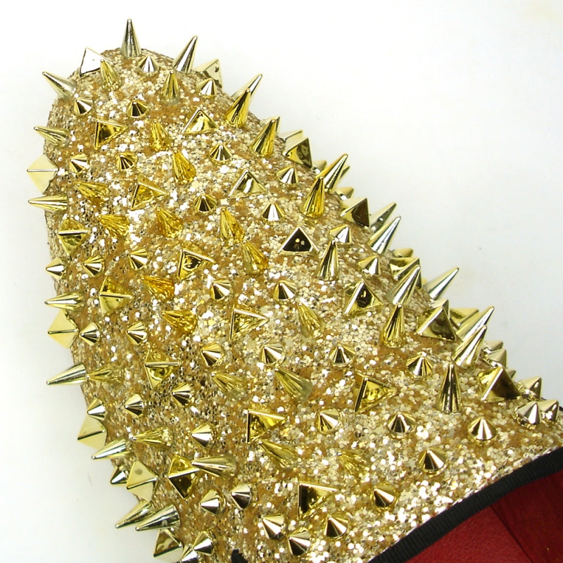 The FI-7239 Gold Glitter Gold Spikes by Fiesso showcases a suede upper embellished with dazzling gold glitter and an array of metallic spikes, combining edgy and glamorous elements for those who want to make a bold statement.