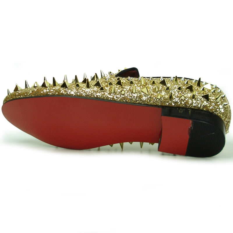 The FI-7239 Gold Glitter Gold Spikes by Fiesso showcases a suede upper embellished with dazzling gold glitter and an array of metallic spikes, combining edgy and glamorous elements for those who want to make a bold statement.