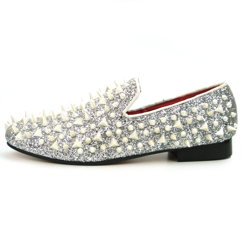 Introducing the FI-7239 Silver Glitter White Spikes Fiesso by Aurelio Garcia from the brand Fiesso: a stylish shoe embellished with spikes and studded pearls on a glittery silver surface, complete with a black sole, red interior lining, and a suede upper.