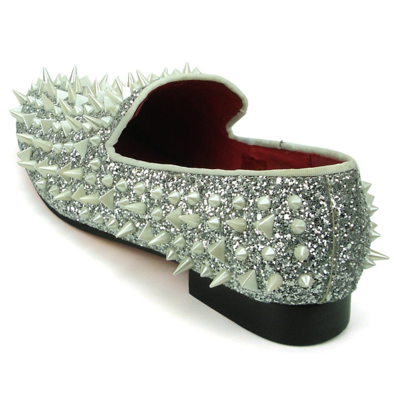 Introducing the FI-7239 Silver Glitter White Spikes Fiesso by Aurelio Garcia from the brand Fiesso: a stylish shoe embellished with spikes and studded pearls on a glittery silver surface, complete with a black sole, red interior lining, and a suede upper.