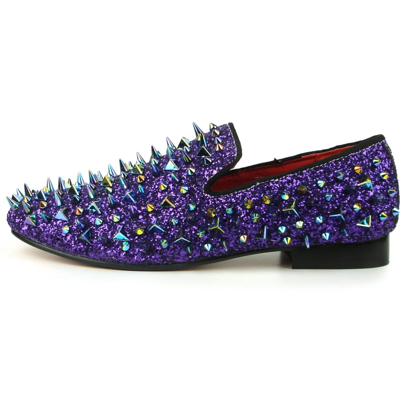 The FI-7239 Purple Glitter Purple Spikes shoe by Fiesso captivates with a striking purple glitter finish, vibrant metallic spikes in various colors, and a premium suede upper, beautifully displayed from the front.