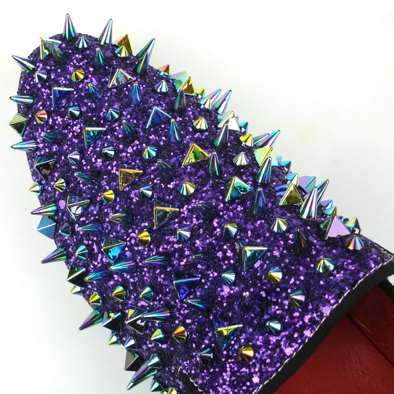 The FI-7239 Purple Glitter Purple Spikes shoe by Fiesso captivates with a striking purple glitter finish, vibrant metallic spikes in various colors, and a premium suede upper, beautifully displayed from the front.