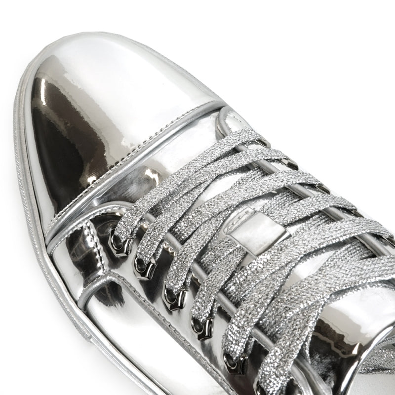 The FI-2415-2 Silver Patent Lace-up Low Cut Leather Sneaker by Fiesso features a metallic silver patent leather finish, complemented by white laces and a cushioned insole, showcased from the back view.