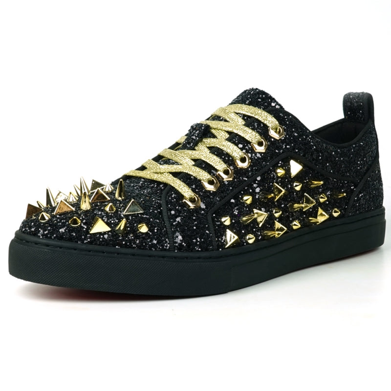 Featuring a striking close-up of the FI-2429 Black Glitter Gold Spikes Low Cut Sneaker Encore by Fiesso, this bold design highlights the shoe's black glitter surface complemented by gold spikes and laces. Embodying Fiesso's signature elegance, this high-fashion men's sneaker shines brilliantly, transforming each stride into a statement of style.