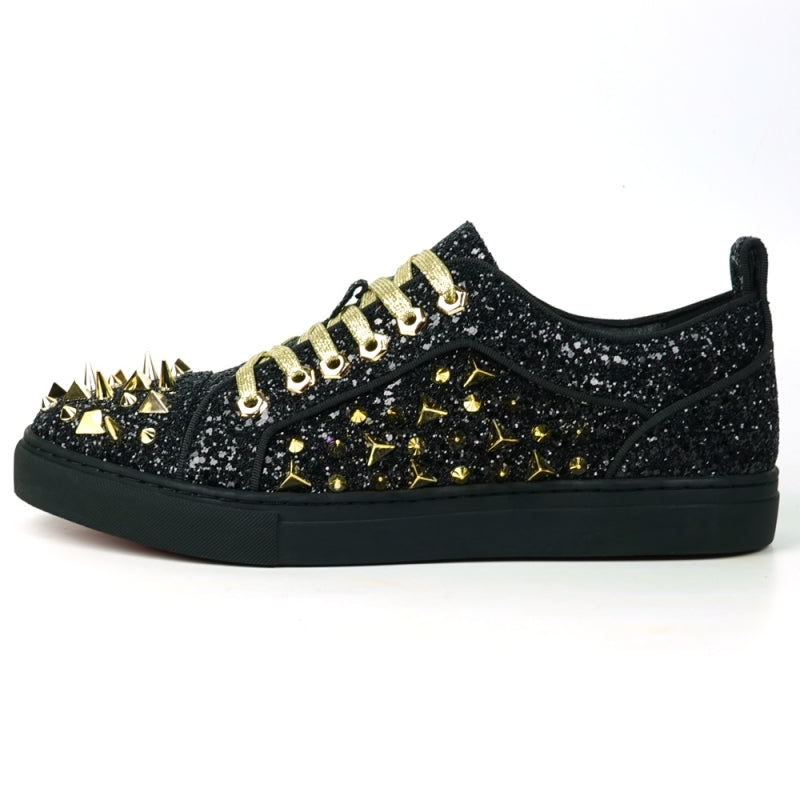 Featuring a striking close-up of the FI-2429 Black Glitter Gold Spikes Low Cut Sneaker Encore by Fiesso, this bold design highlights the shoe's black glitter surface complemented by gold spikes and laces. Embodying Fiesso's signature elegance, this high-fashion men's sneaker shines brilliantly, transforming each stride into a statement of style.