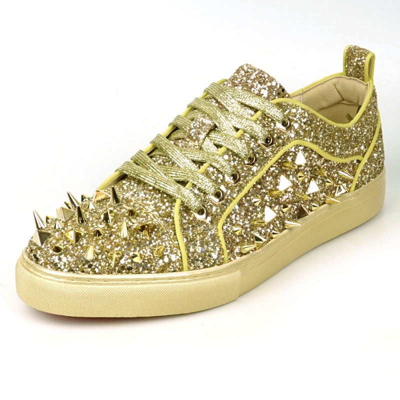 Introducing the FI-2429 Gold Glitter Gold Spikes Low Cut Sneaker Encore by Fiesso: This dazzling sneaker from Fiesso boasts a leather upper adorned with metallic spikes and studs on the toe and sides, complemented by a cushioned insole for ultimate comfort.