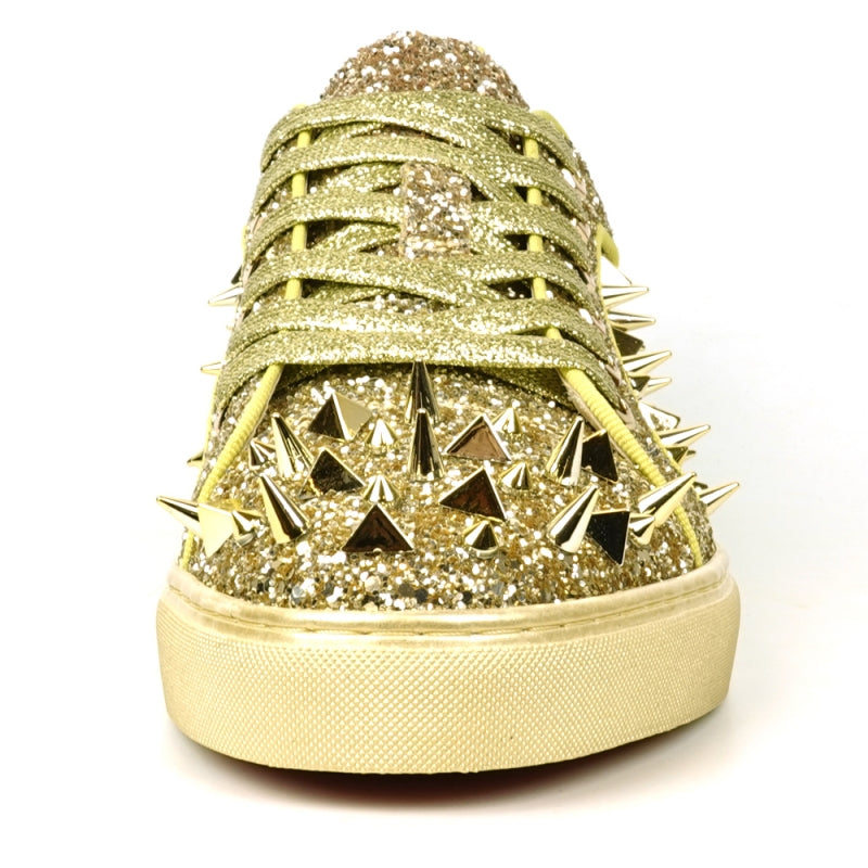 Introducing the FI-2429 Gold Glitter Gold Spikes Low Cut Sneaker Encore by Fiesso: This dazzling sneaker from Fiesso boasts a leather upper adorned with metallic spikes and studs on the toe and sides, complemented by a cushioned insole for ultimate comfort.