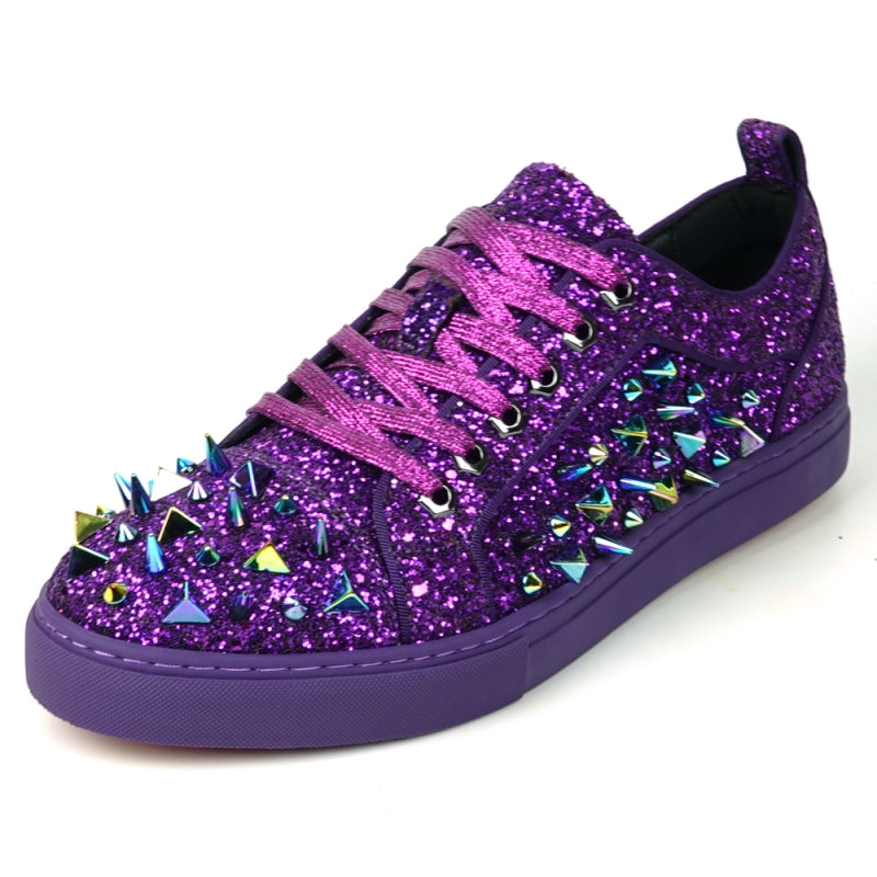 Close-up of the Encore by Fiesso, FI-2429 low-cut sneaker, showcasing a high-fashion design with purple glitter and spikes, complemented by multicolored triangular metal accents and purple laces.