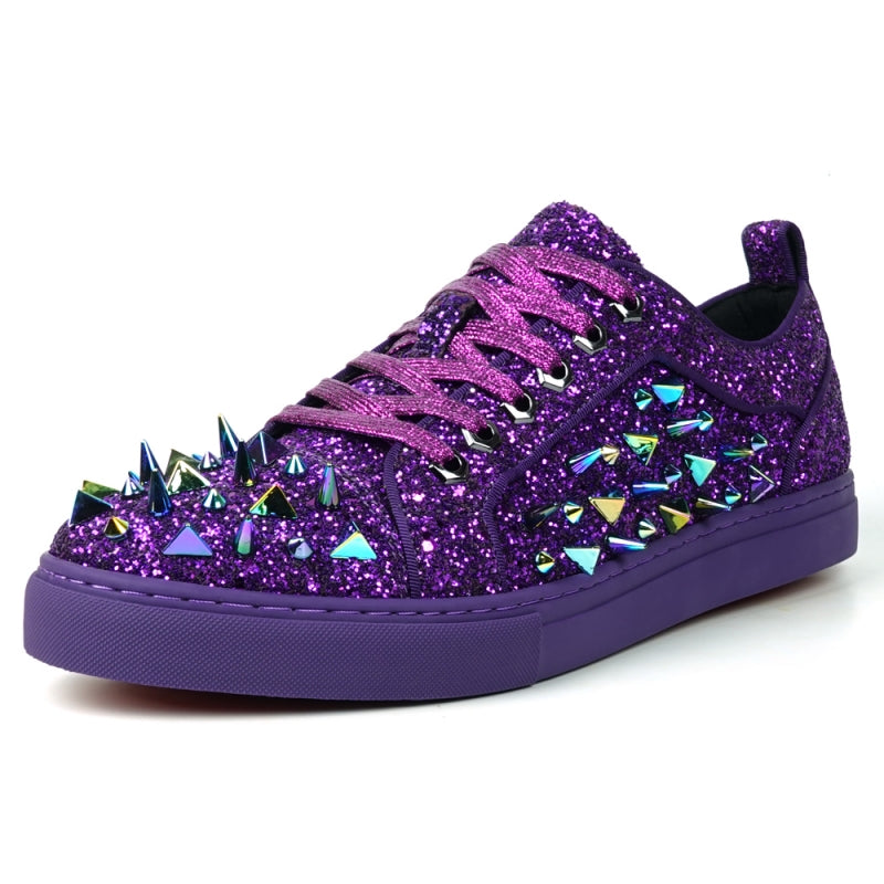 Close-up of the Encore by Fiesso, FI-2429 low-cut sneaker, showcasing a high-fashion design with purple glitter and spikes, complemented by multicolored triangular metal accents and purple laces.