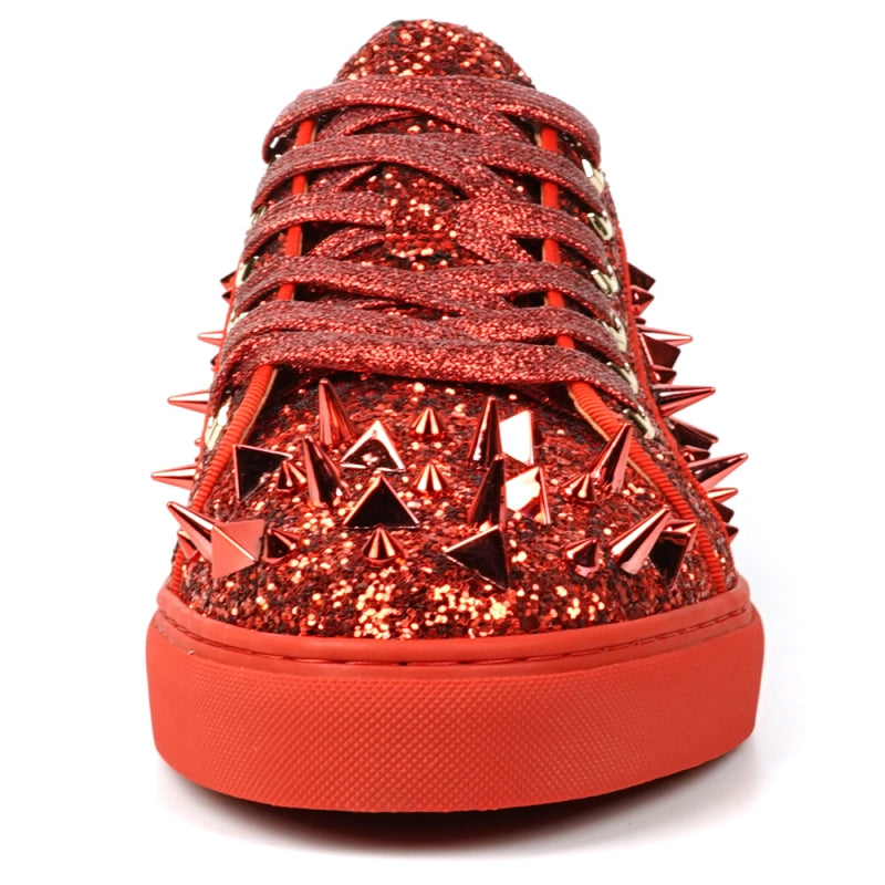 A close-up of the FI-2429 Red Glitter Red Spikes Low Cut Sneaker Encore by Fiesso showcases its dazzling red glitter, bold metal spikes, and matching shoelaces.