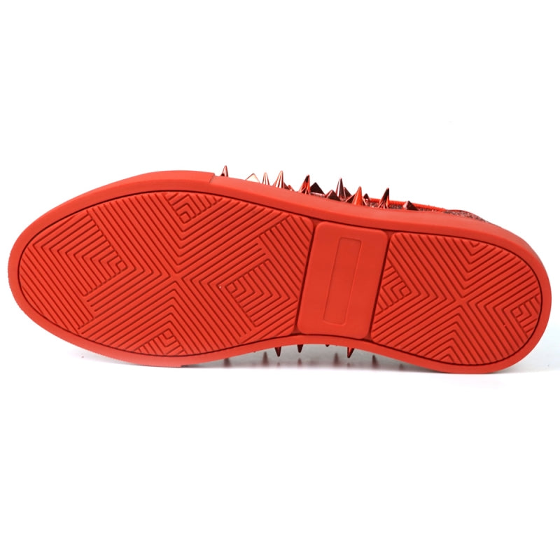 A close-up of the FI-2429 Red Glitter Red Spikes Low Cut Sneaker Encore by Fiesso showcases its dazzling red glitter, bold metal spikes, and matching shoelaces.