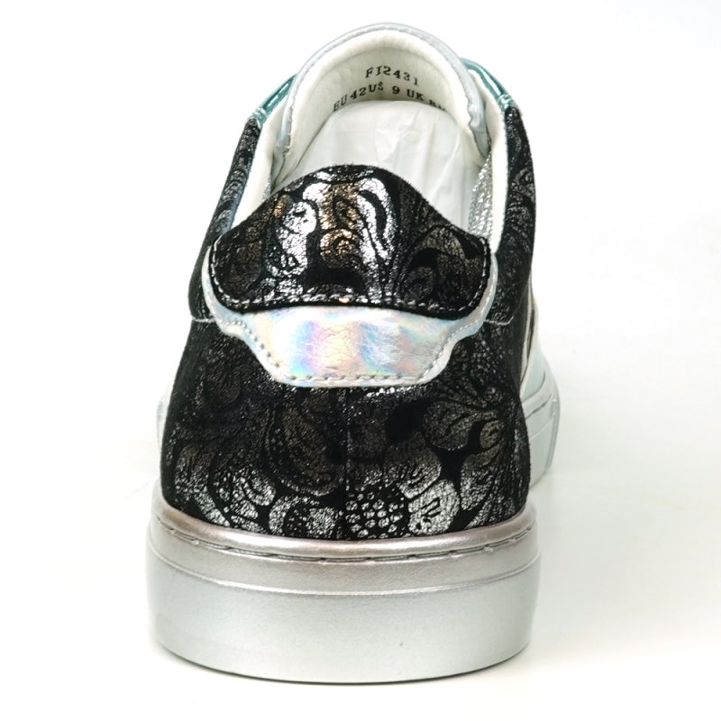 Step up your style with the FI-2431 Silver Multi Lace-Up Low Cut Sneaker Encore by Fiesso, showcasing a dynamic design that includes shiny turquoise and silver sections, glittery silver laces, intricate black lace-like patterns, and an eye-catching gold zigzag detail on the side.