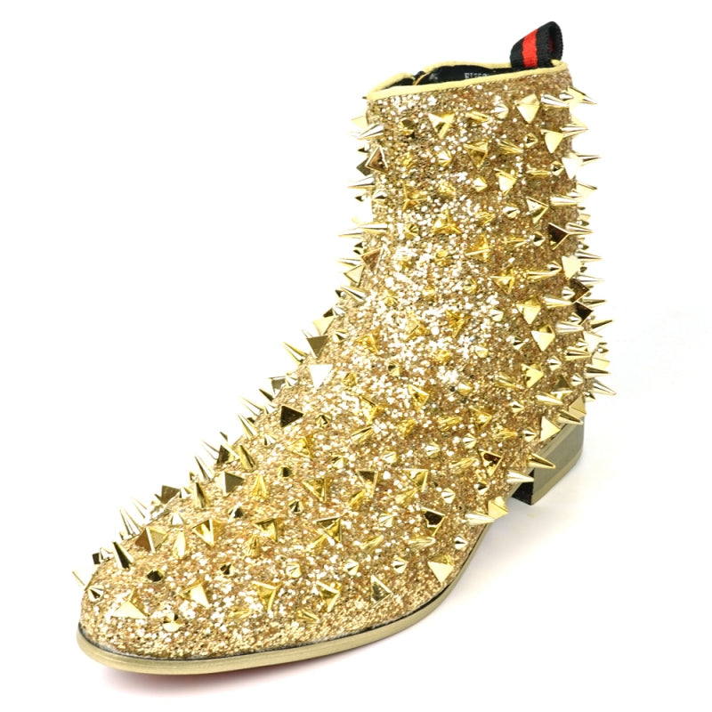 Close-up of the FI-7527 Gold Glitter Gold Spikes Boot Encore by Fiesso, featuring a sparkly gold surface embellished with an array of metallic spikes in different sizes and shapes, capturing the edgy elegance typical of high fashion sneakers against a plain background.