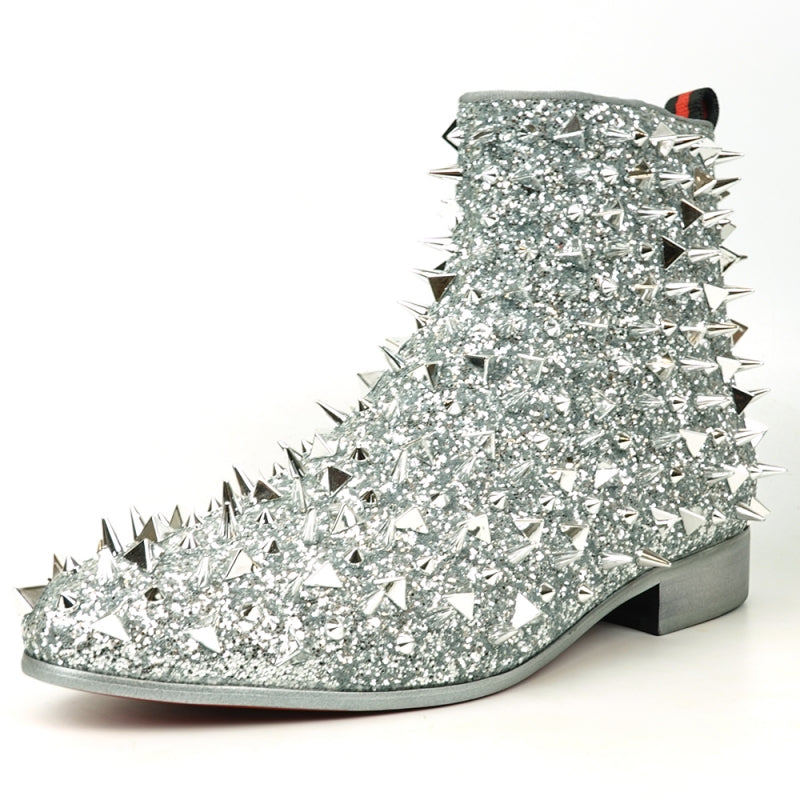 The FI-7527 Silver Glitter Silver Spikes Boot Encore by Fiesso captivates with its sparkling material and metallic spikes. Complemented by a low heel and red pull tab, it echoes the bold style of black glitter boots.