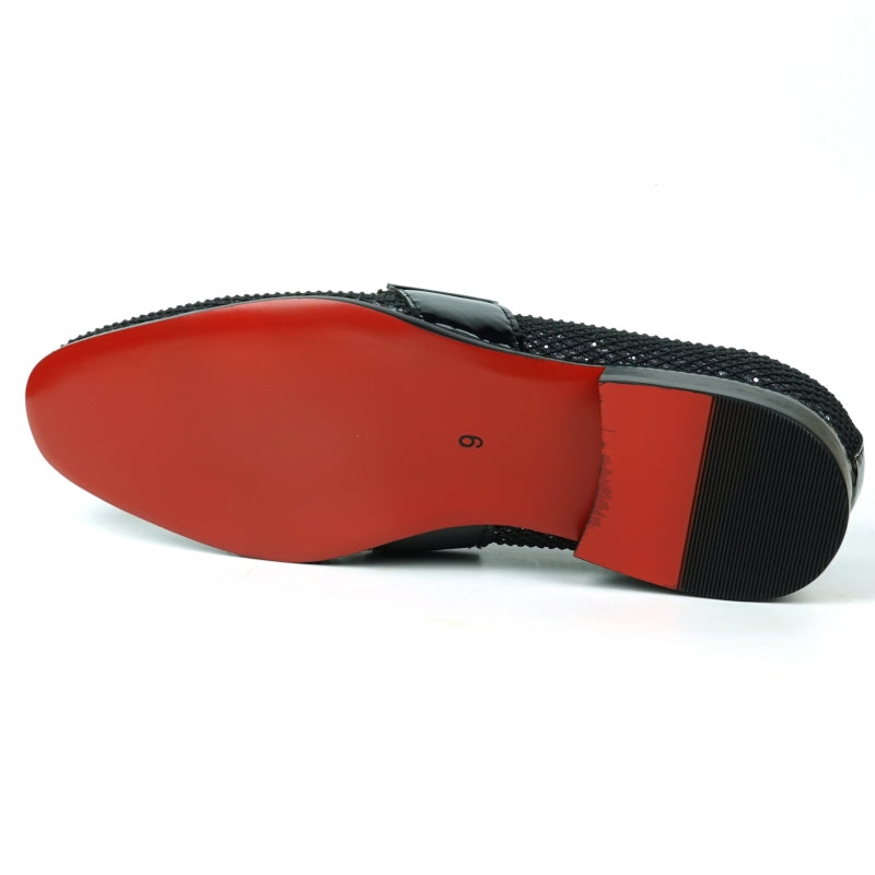 The Fiesso FI-7528 Black Silver Slip-On Loafer is a sophisticated men's dress shoe, featuring a textured leather exterior with a shiny finish. It is elegantly adorned with silver chains across the top and boasts a striking red interior lining, making it the perfect blend of modern style and elegance.