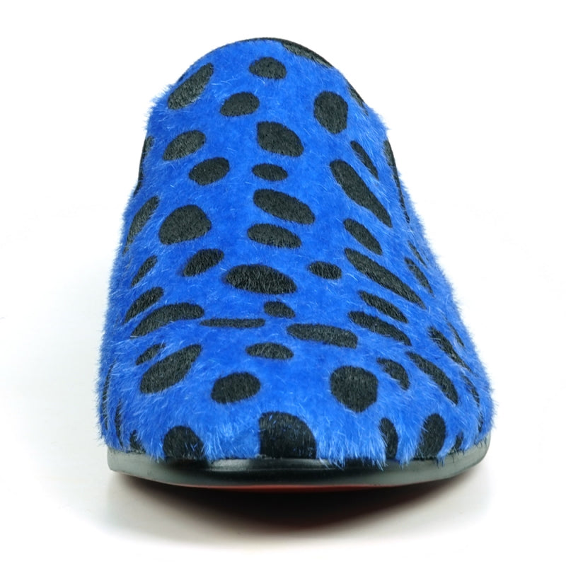 A slip-on loafer featuring a blue and black leopard print design with a pony hair texture, capturing the stylish essence of Fiesso by Aurelio Garcia when admired from the front.