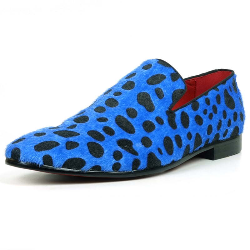 A slip-on loafer featuring a blue and black leopard print design with a pony hair texture, capturing the stylish essence of Fiesso by Aurelio Garcia when admired from the front.