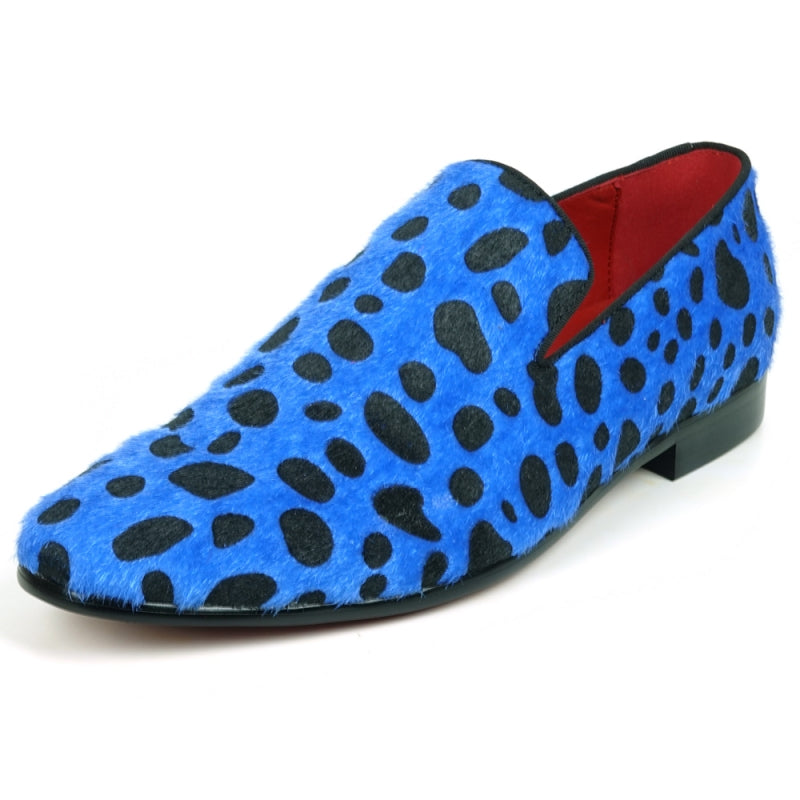 A slip-on loafer featuring a blue and black leopard print design with a pony hair texture, capturing the stylish essence of Fiesso by Aurelio Garcia when admired from the front.