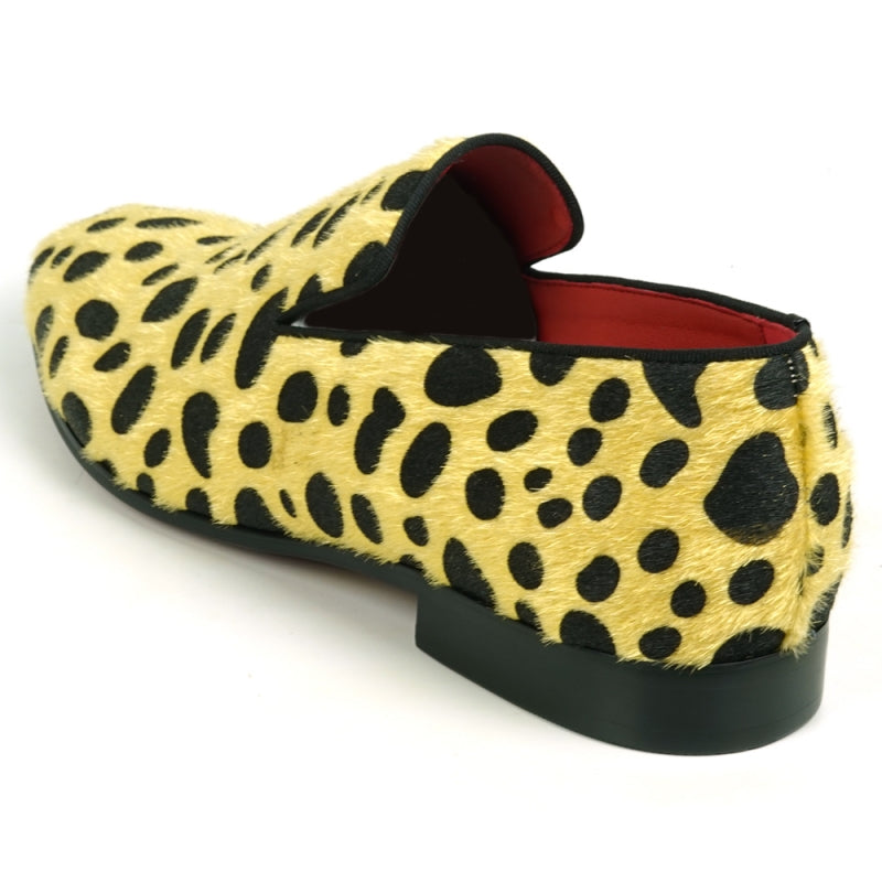 Introducing the FI-7532 Black Gold Leopard Print Pony Hair Slip On Loafer by Fiesso, these stunning loafers are designed with luxurious pony hair adorned with bold black leopard spots and feature a striking red interior. Perfect for making a statement, they elevate any outfit with their unique design and sophisticated flair.