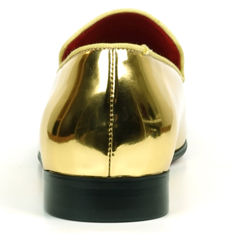 A close-up of the FI-7548 Gold Patent Slip On Leafer by Fiesso, exuding the polished elegance typical of Aurelio Garcia's designs, set against a white background.