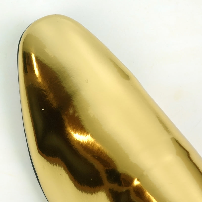 A close-up of the FI-7548 Gold Patent Slip On Leafer by Fiesso, exuding the polished elegance typical of Aurelio Garcia's designs, set against a white background.