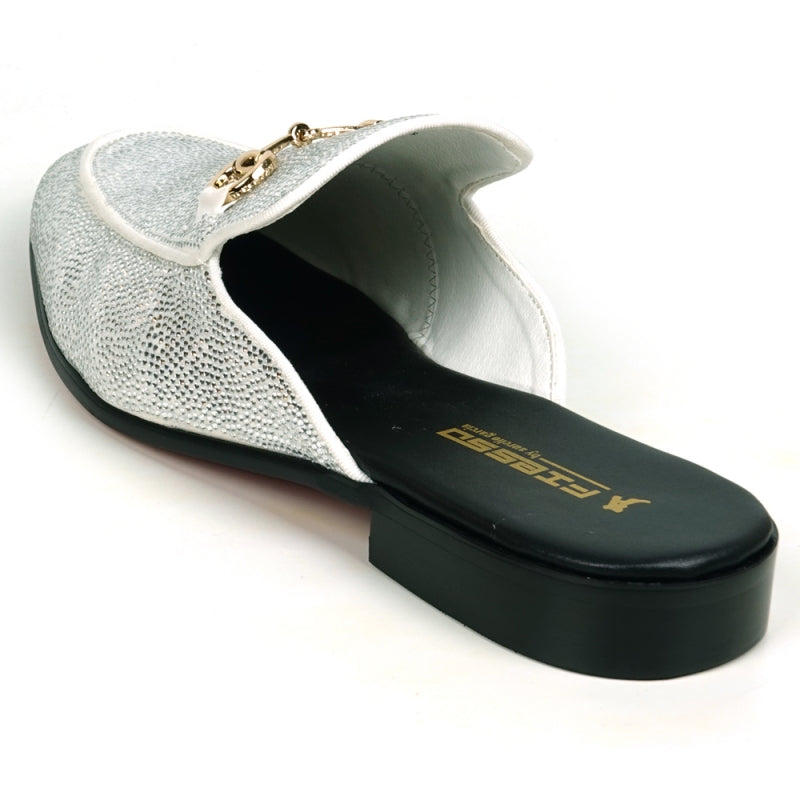 Front view of a Fiesso by Aurelio Garcia sparkling white rhinestone sandal, crafted from suede with a gold ornament detail on the upper.