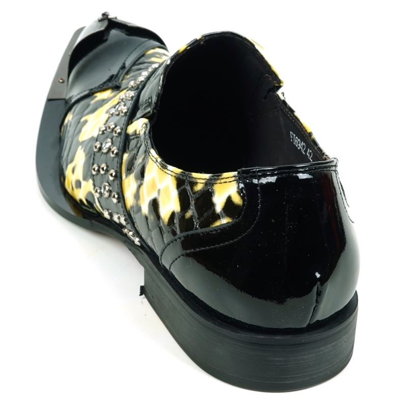 Back view of the shiny FI-6942 Black White Fiesso by Aurelio Garcia, featuring a black patent leather finish with a distinctive yellow and white pattern, adorned with metal studs on the side and a black sole for both style and comfort.