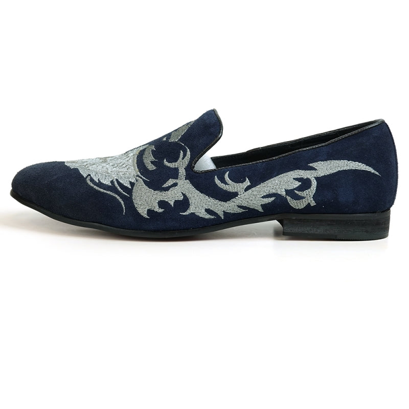 A stylish FI-7039 Navy Suede Slip-on Loafer by Fiesso, showcasing elegant silver embroidery and a black sole, viewed from the side.