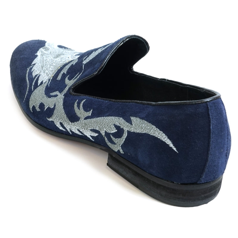 A stylish FI-7039 Navy Suede Slip-on Loafer by Fiesso, showcasing elegant silver embroidery and a black sole, viewed from the side.