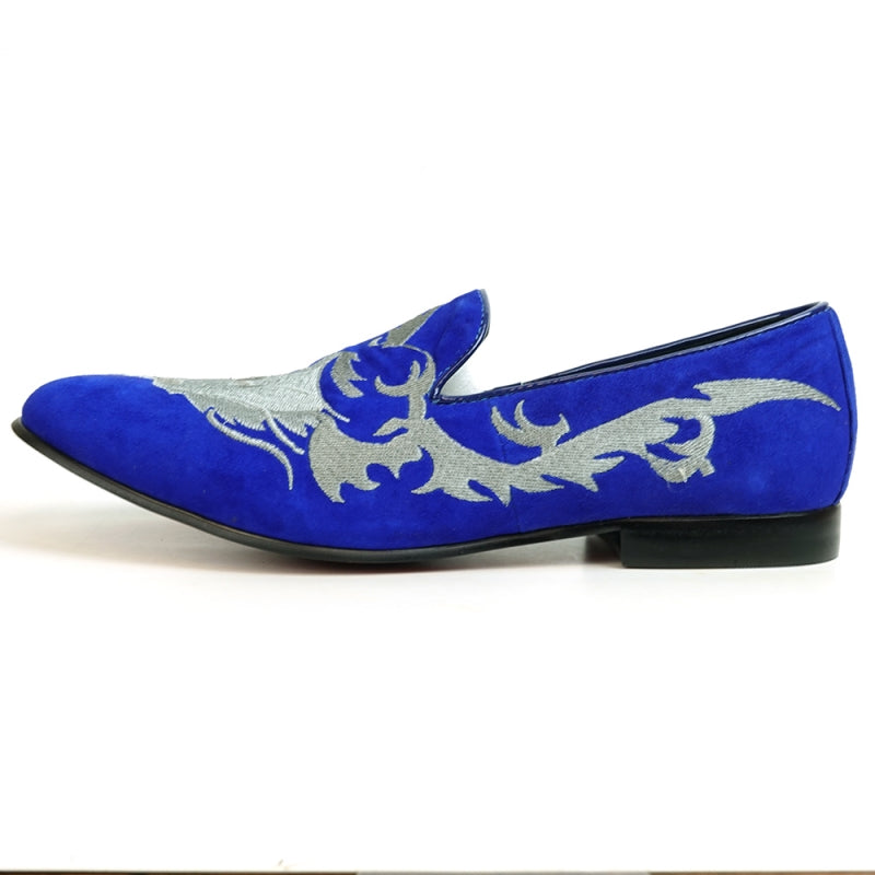 The FI-7039 Royal Blue Suede Slip-on Loafer by Fiesso showcases a sophisticated blue suede upper with silver embroidery and a sleek black sole, seen from the back.