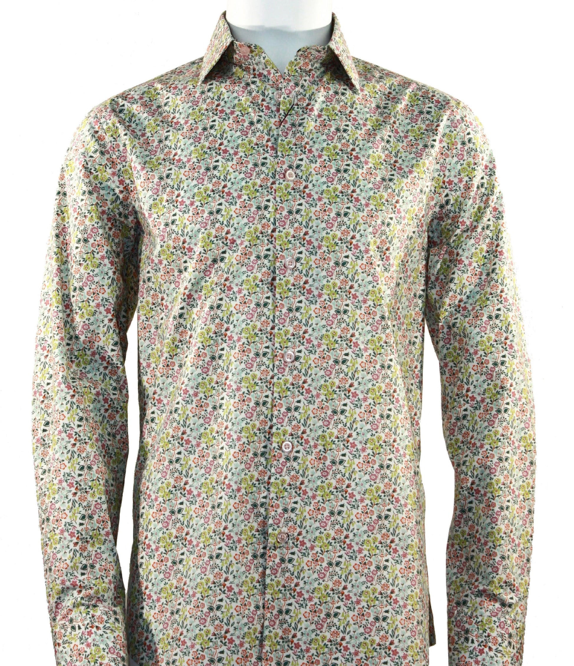 The Cado Long Sleeve Pink Shirt 158 by Cado, a modern-fit button-up crafted from soft cotton, features a vibrant floral design and is displayed on a mannequin.