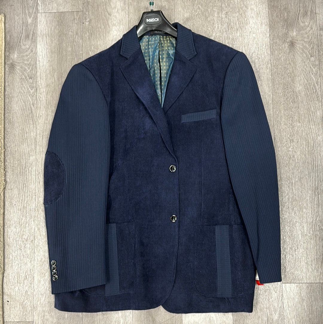 The Inserch Blazer BL506-11 Navy (available in size 3XL only) is a men's blazer featuring two buttons, patch pockets, pinstriped sleeves, and elbow patches. Its stylish patterned interior lining enhances its elegant appearance on a hanger.