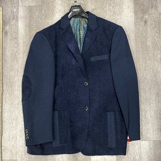 The Inserch Blazer BL506-11 Navy (available in size 3XL only) is a men's blazer featuring two buttons, patch pockets, pinstriped sleeves, and elbow patches. Its stylish patterned interior lining enhances its elegant appearance on a hanger.