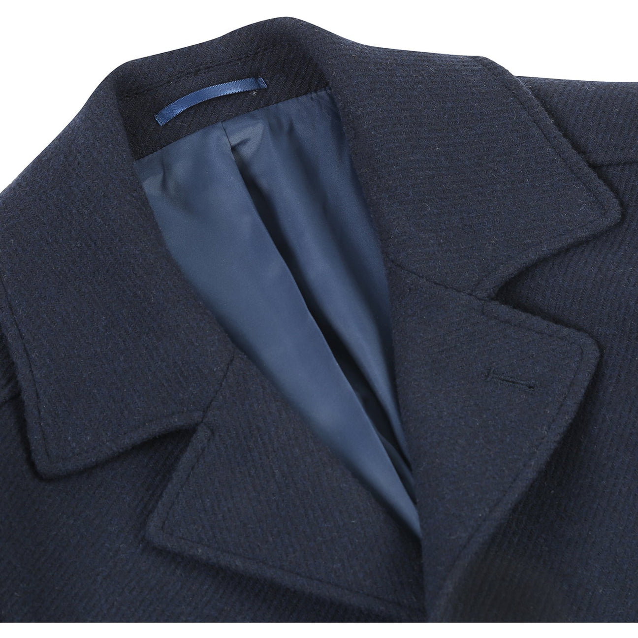 Navy long coat by Alessandro Vitello, model 830-2, featuring a single-breasted design with a notched lapel and cuff straps, displayed on an invisible mannequin against a white background.