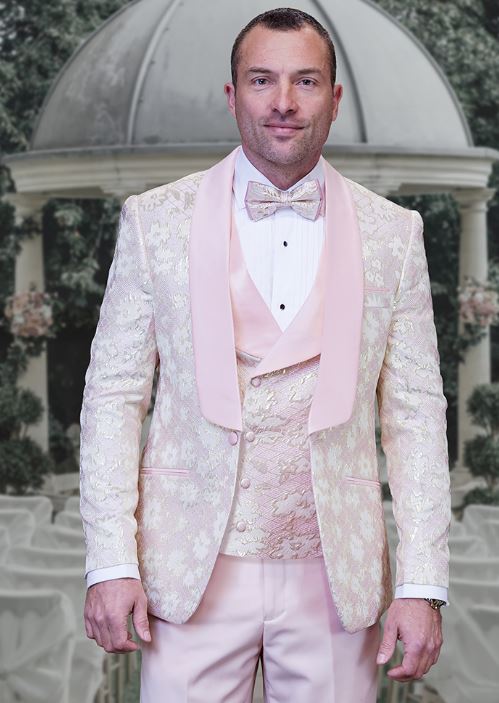 A man wearing an Inserch STATEMENT TIZANO BLUSH Suit poses in front of a gazebo backdrop.