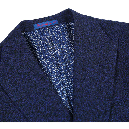 English Laundry's Blue Check Suit (92-05-410EL) showcases a dark blue blazer crafted with a textured fabric, complemented by a geometric patterned inner lining and designed in a slim fit featuring elegant peak lapels.