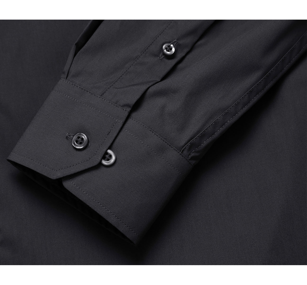 The Renoir VERNO Black Classic Fit Long Sleeve Travel Easy-Care Cotton Dress Shirt (CS0223) is folded neatly, showcasing a close-up inset of its wrinkle-resistant fabric texture.