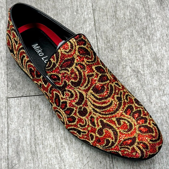 The Exclusive Formal Dress Shoe Res / Gold B2380 from UNIQUE DESIGN MENSWEAR is a slip-on crafted from full genuine leather, showcasing an ornate red and gold swirling pattern on a gray base.