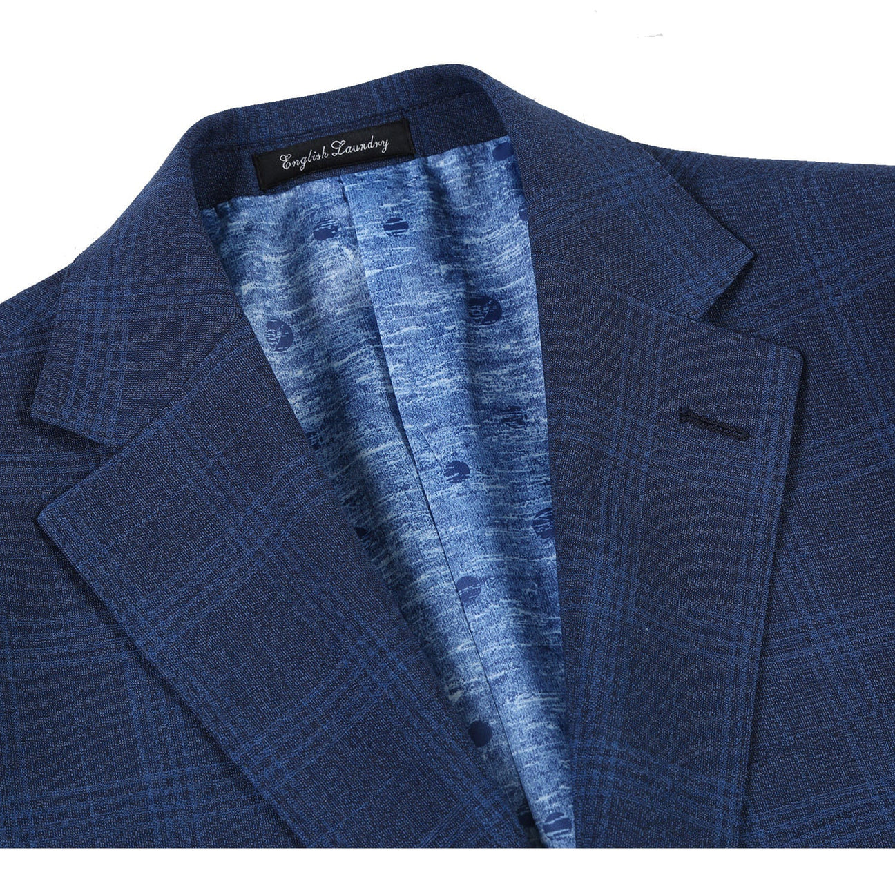 The ENGLISH LAUNDRY Airforce Blue Plaid Wool Suit (EL72-50-412) from English Laundry is displayed on a mannequin. Featuring a stretch wool blend for the ultimate comfort, it elegantly pairs with a white shirt and blue tie, showcasing its slim fit silhouette against a plain backdrop.