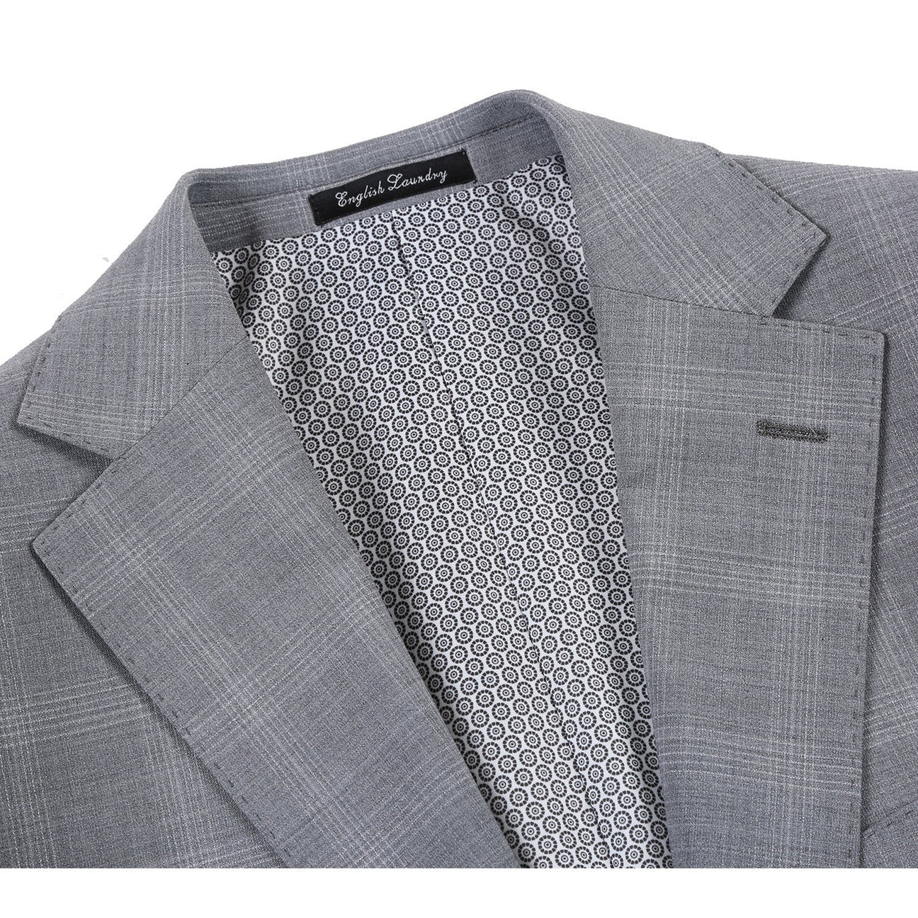 The ENGLISH LAUNDRY Light Gray Window Pane Check Wool Suit, model EL72-62-092 by English Laundry, is displayed on a mannequin with peak lapels, accompanied by a sharp white shirt and a vibrant orange patterned tie.